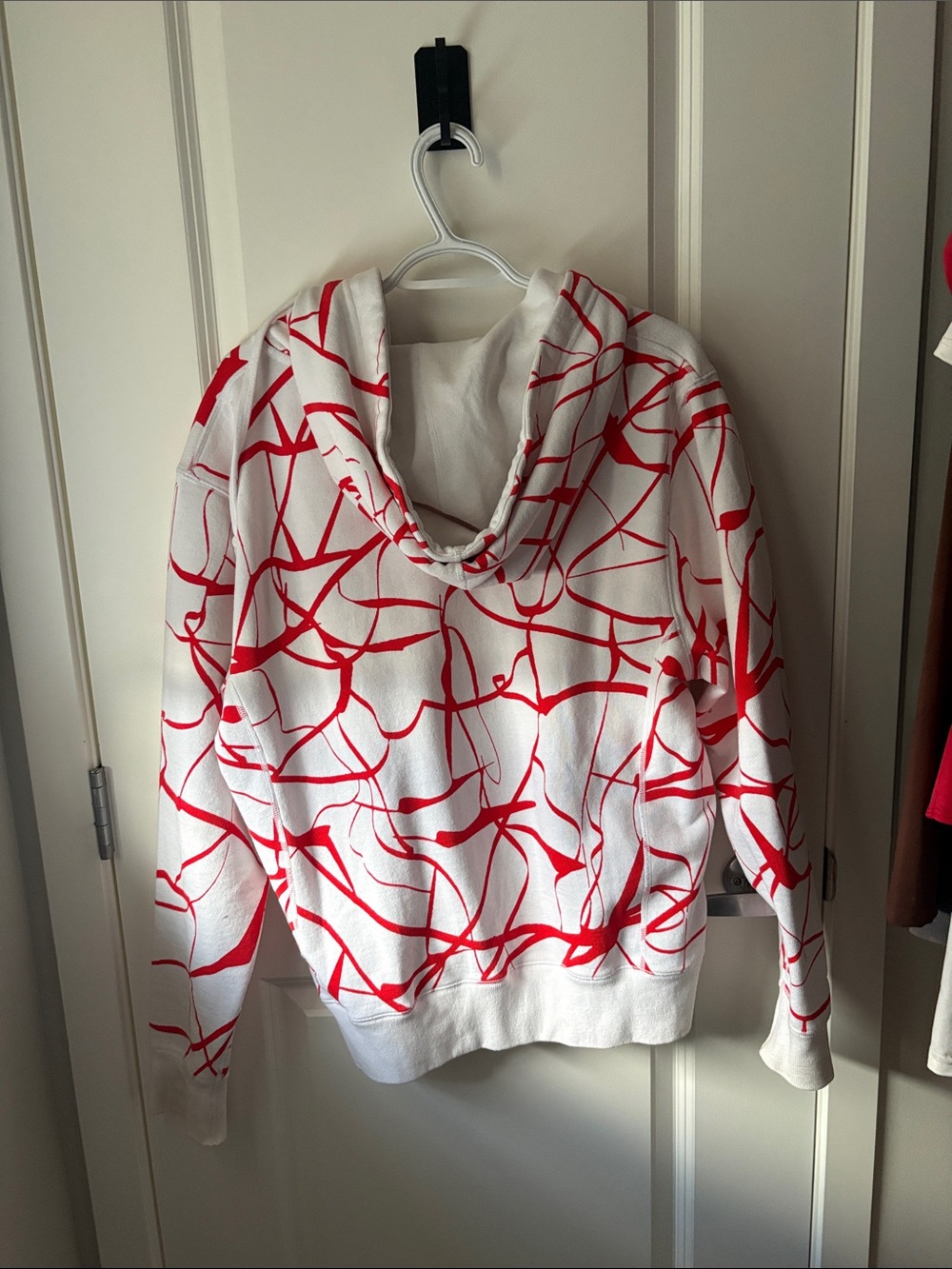 Supreme White Hoodie with Red Abstract Graphic - Picture 3 of 3